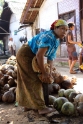 Manual coconut shelling, Java Pangandaran Indonesia